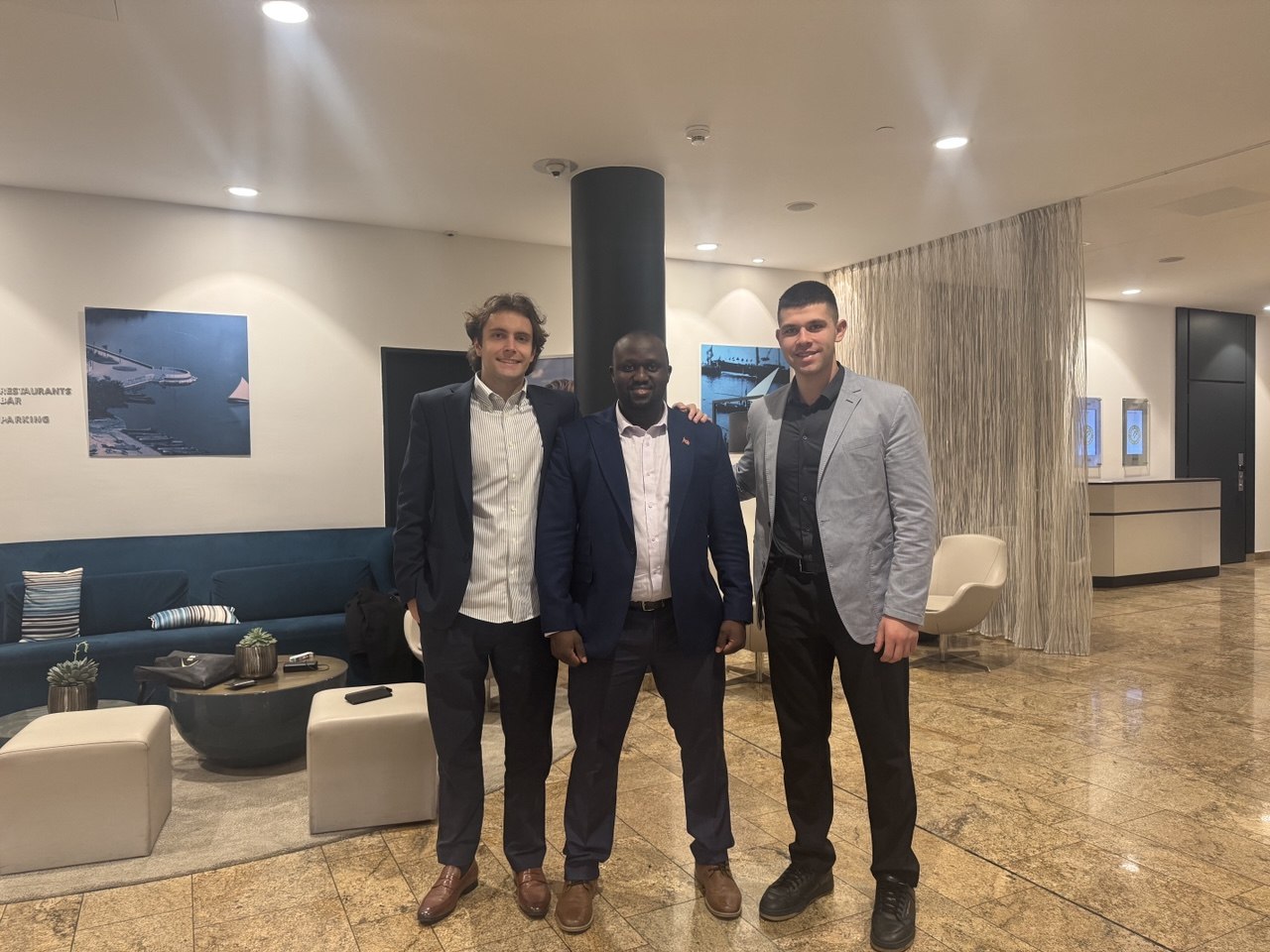 The co-founders meeting a fellow Congress attendee.