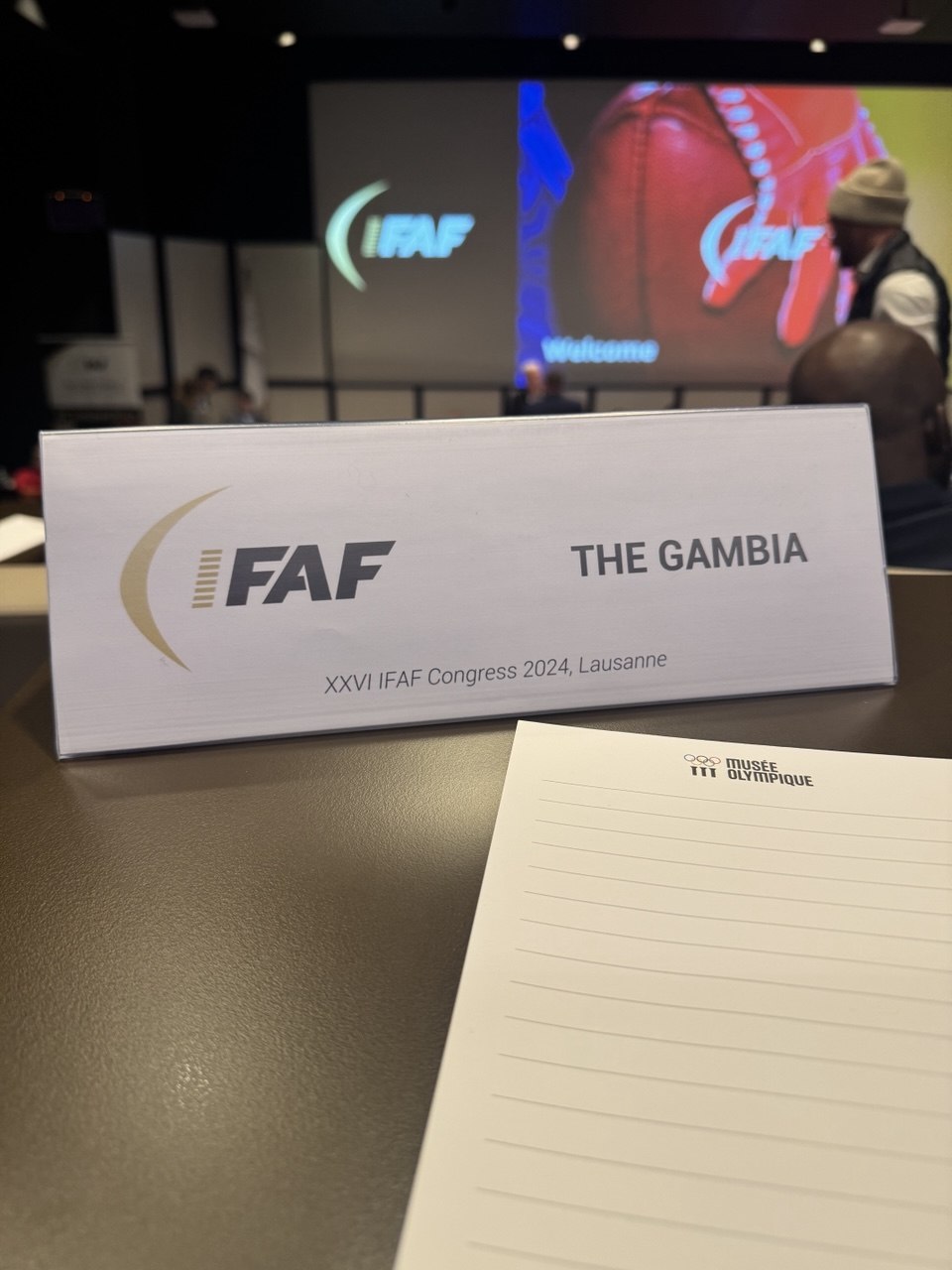 The Gambia’s place card: XXVI IFAF Congress 2024, Lausanne.