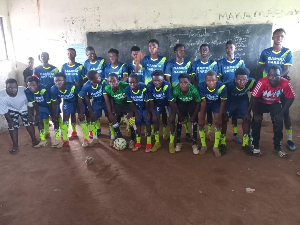 Players and team members in a classroom